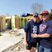 Katie and Bob Jazwinski stand in front of their severely damaged home in the Carriage Hills neighborhood in Dexter on March 22, 2012. The Jazwinski's survived the March 15, 2012 tornado by hiding in a closet inside a bedroom of the house. Angela J. Cesere | AnnArbor.com
